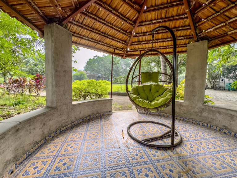 A quiet corner in the garden gazebo at NB Nature Stay